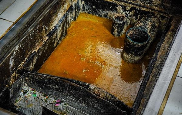 we use a combination of hydro-jetting and enzyme treatments for efficient grease trap cleaning